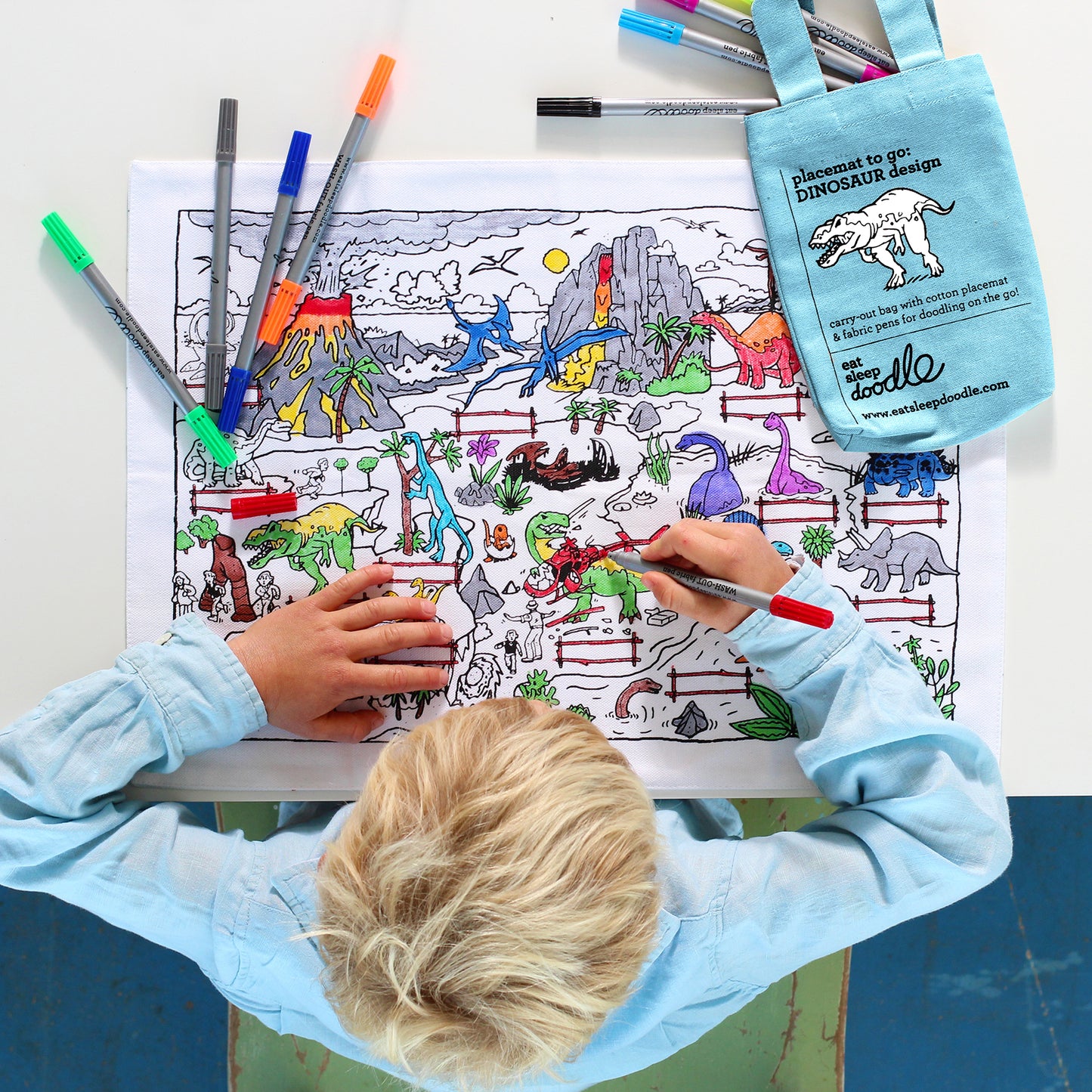 Eat Sleep Doodle dinosaur placemat to go
